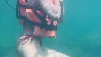 Asian student swims in the sea and plays with her pussy-aminaviktor